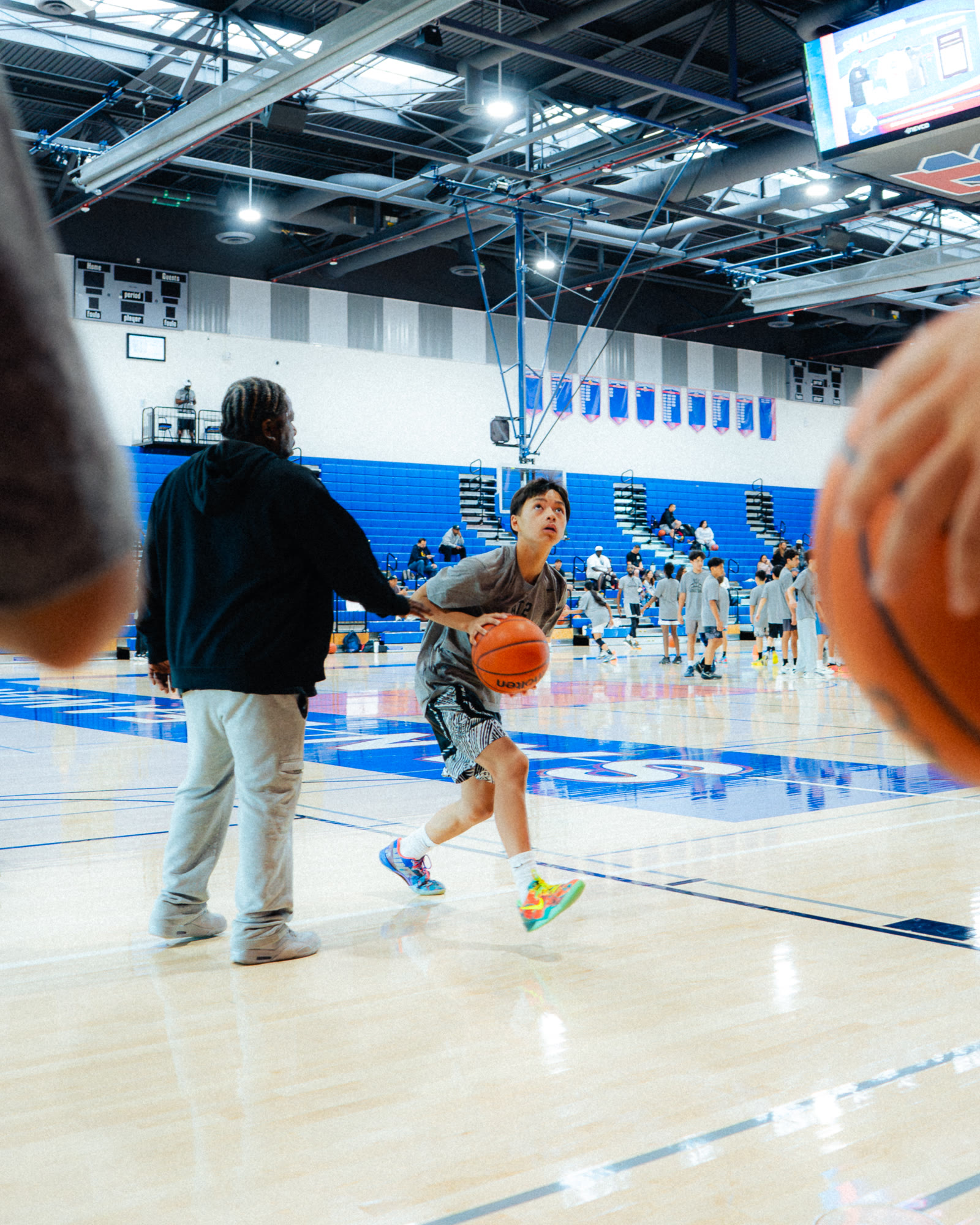 A player working one-on-one with an AT2 coach