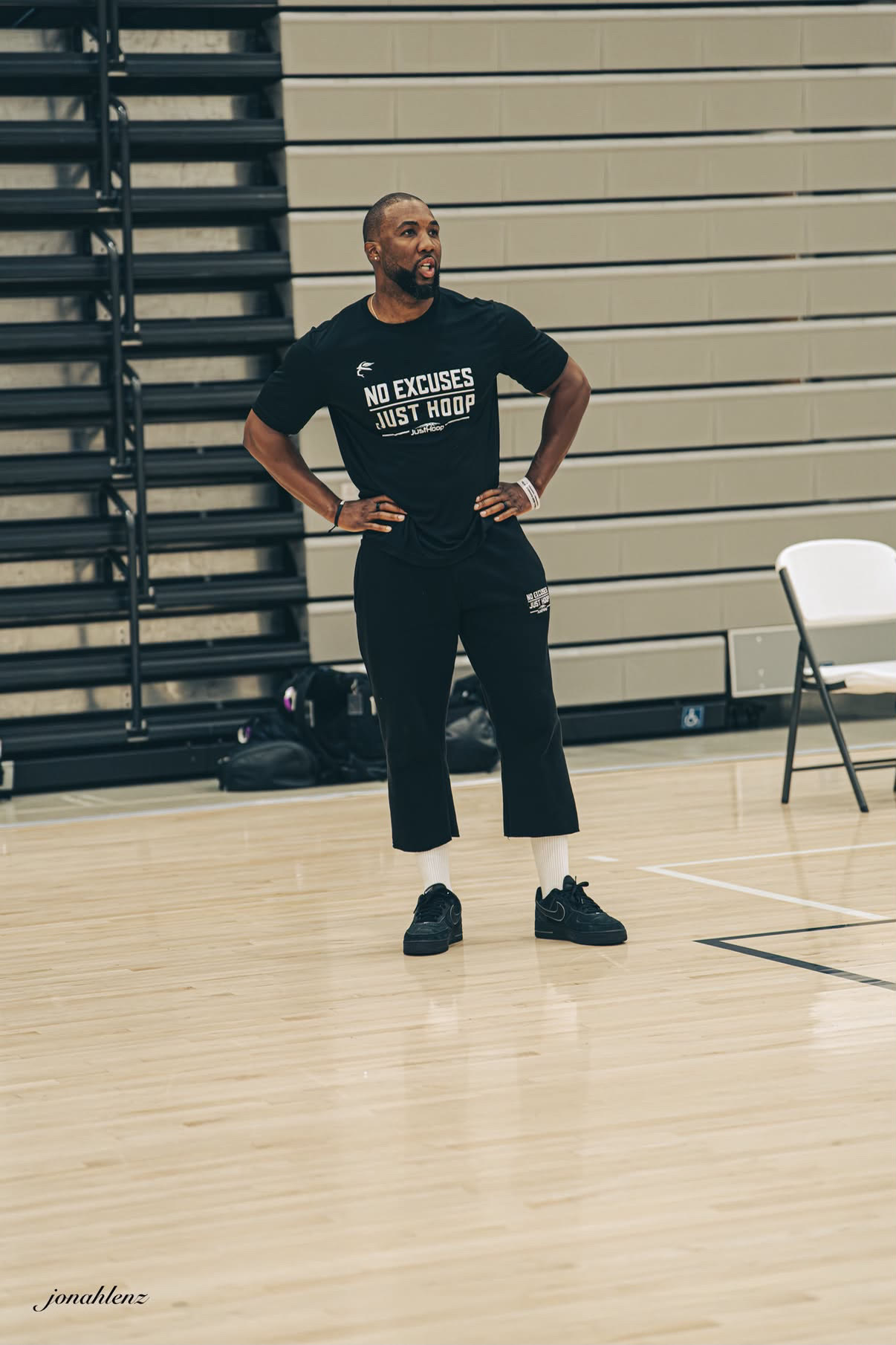 The JustHoop director on the court in a No Excuses Just Hoop tee