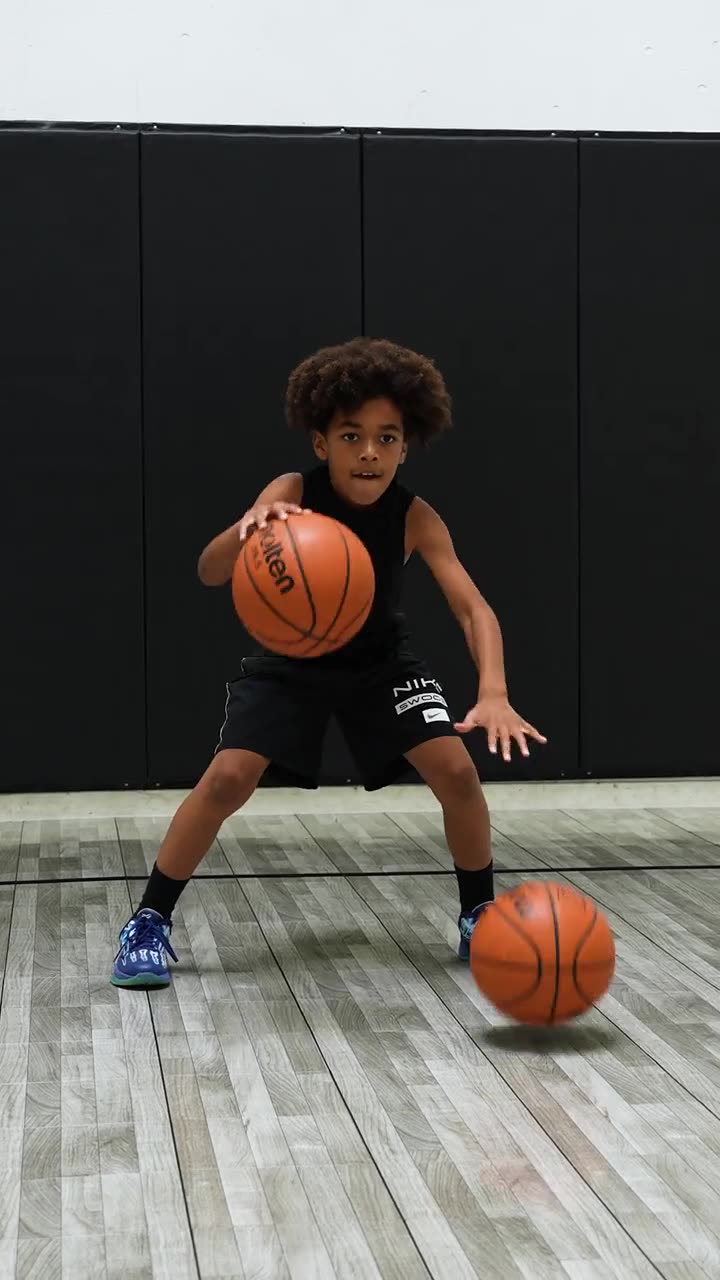 A young player running a dribbling series in a private session