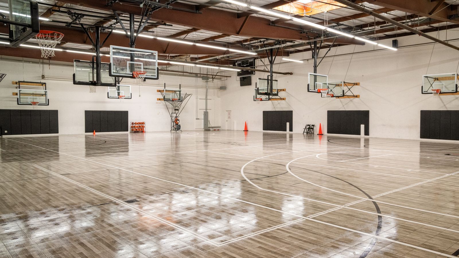 The full Ultimate Training Facility gym in San Leandro — both courts under one roof